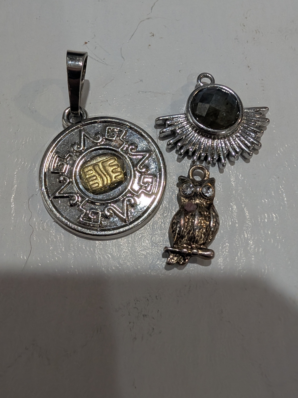 Silver and Gold Tone Round Pendant with Owl and Sunburst Charms